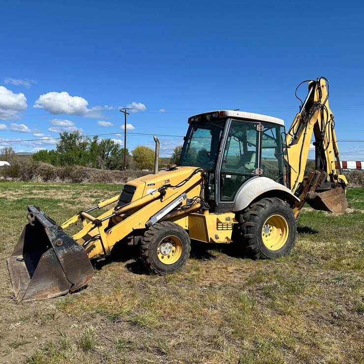 NEW HOLLAND 555E