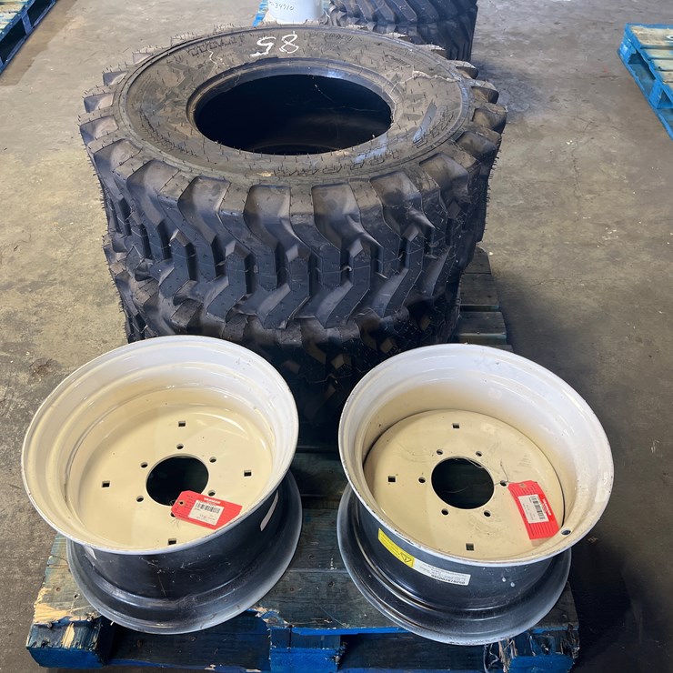 #85 • 2 YANMAR RIMS AND TIRES
