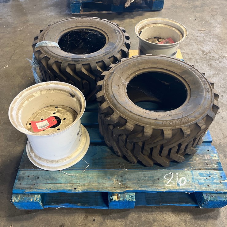 #86 • 2 YANMAR TIRES AND RIMS
