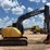 2009-deere-135d-image-5
