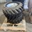 #92-•-lot-of-2-yanmar-rims-and-tires-image-1