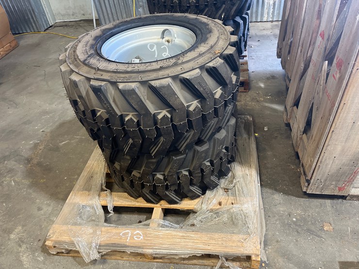 #92-•-lot-of-2-yanmar-rims-and-tires-image-1
