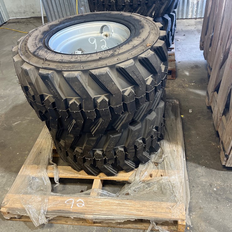 #92 • LOT OF 2 YANMAR RIMS AND TIRES