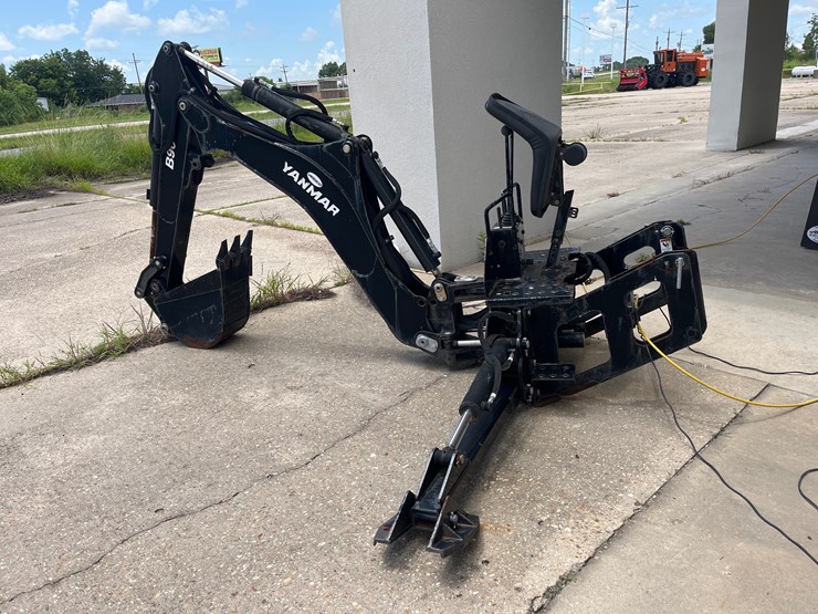 #7-•-yanmar-digging-attachment-with-bucket-and-hydraulic-levers-image-1