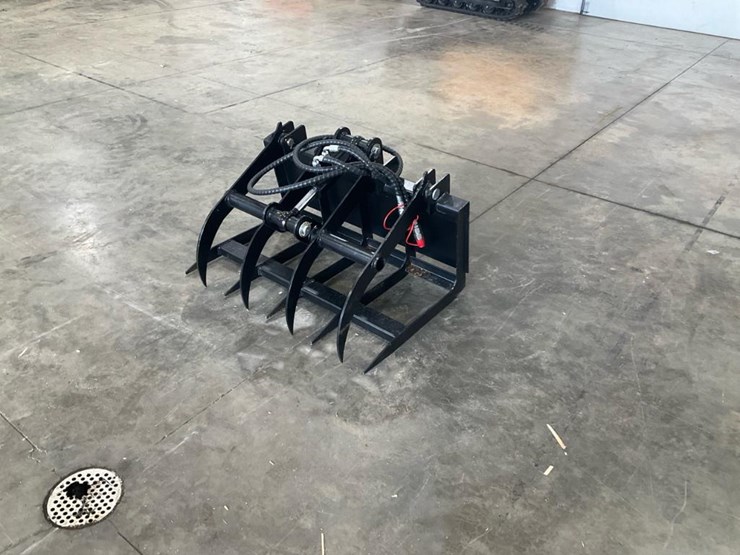 #1361-•-unused-mini-skid-steer-grapple-image-1