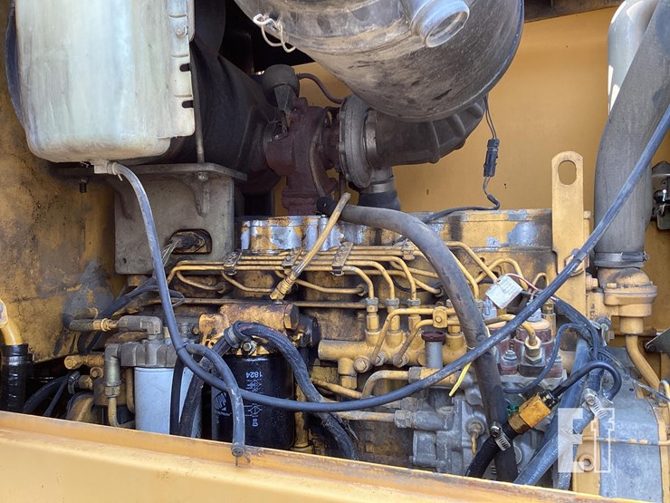 2002-deere-724j-image-11
