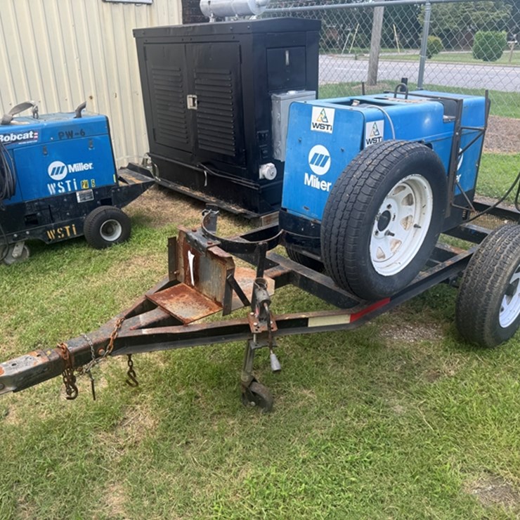 MILLER LEGEND WELDER/GENERATOR ON TRAILER