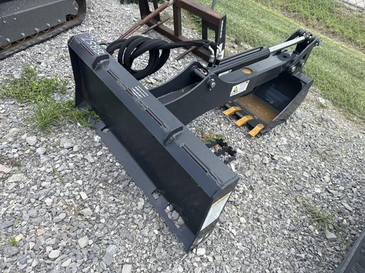 land-honor,-skid-steer-backhoe-image-1