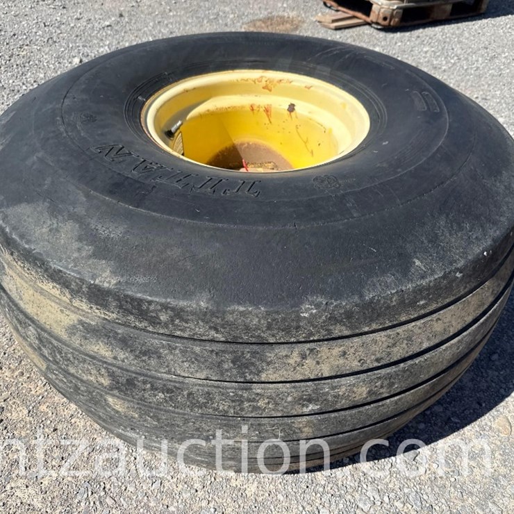 TITAN 21.5L-16.1 TIRE FOR 568 BALER W/ 8 HOLE RIM