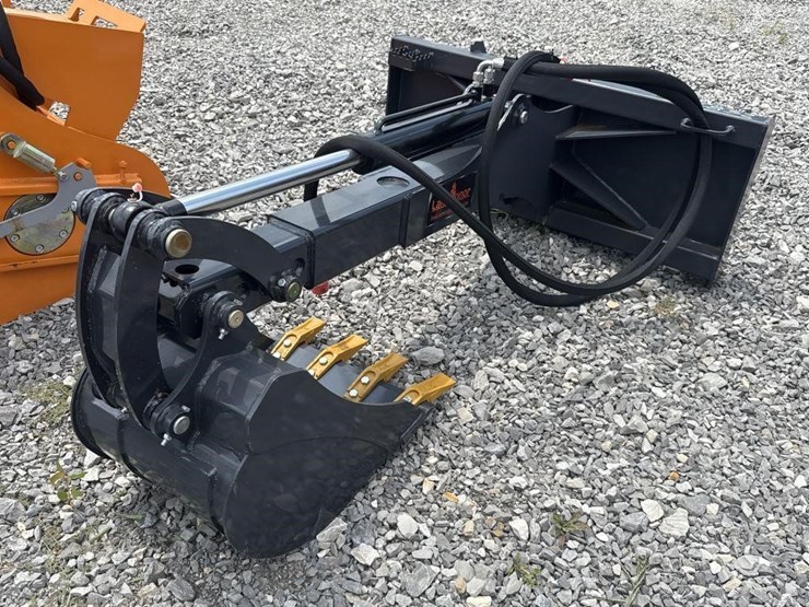 land-honor,-skid-steer-backhoe-image-3