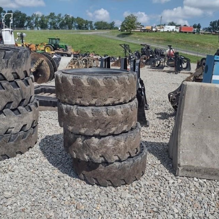 (4) 31X10-20 SOLID TIRES W/RIMS