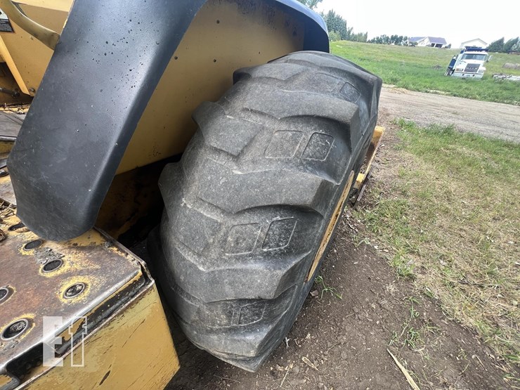 2006-deere-210le-image-9