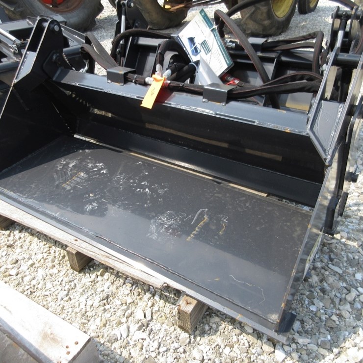 Wolverine Mini Skid Steer Combination Bucket
