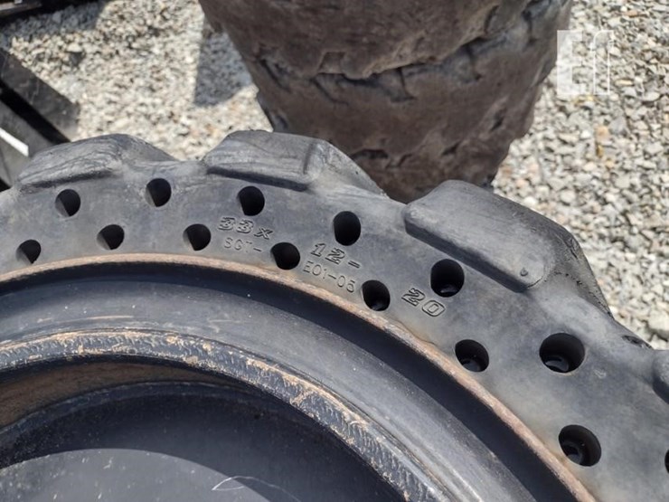 (4)-33x12-20-solid-tires-w/rims-image-3