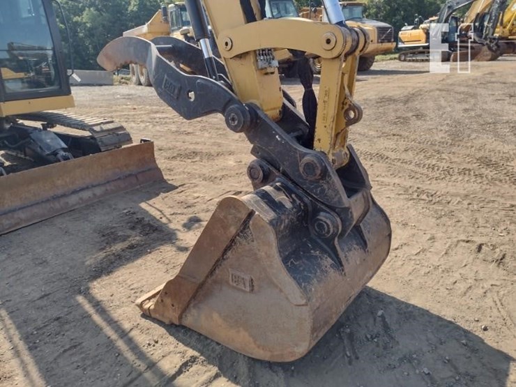 2023-caterpillar-310-image-18