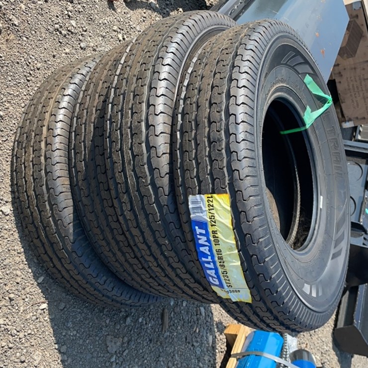 #1010 • QTY 4) ST235 / 85R16 TRAILER TIRES