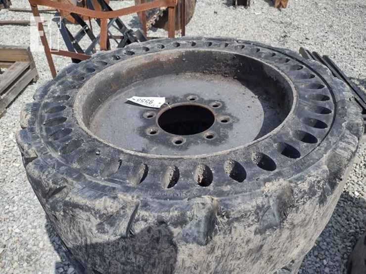 (4)-12-16.5-solid-tires-w/rims-image-2