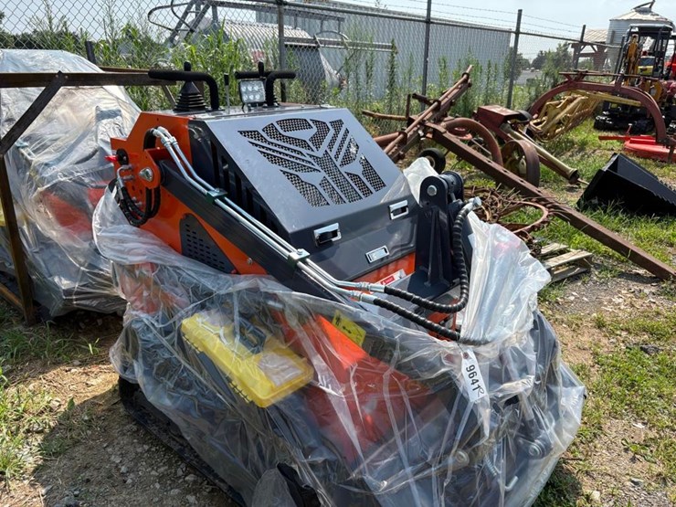 tpm-t460-stand-on-skid-steer-loader-image-1