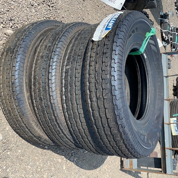 #1034 • QTY 4) ST235 / 85R16 TRAILER TIRES