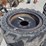 (4)-33x12-20-solid-tires-w/rims-image-2