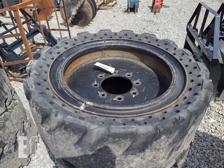 (4)-33x12-20-solid-tires-w/rims-image-2