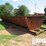 (8-9)-4'7"h-x-10'w-x-40'l-half-round-steel-mud-tan-image-2