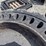 (4)-12-16.5-solid-tires-w/rims-image-3