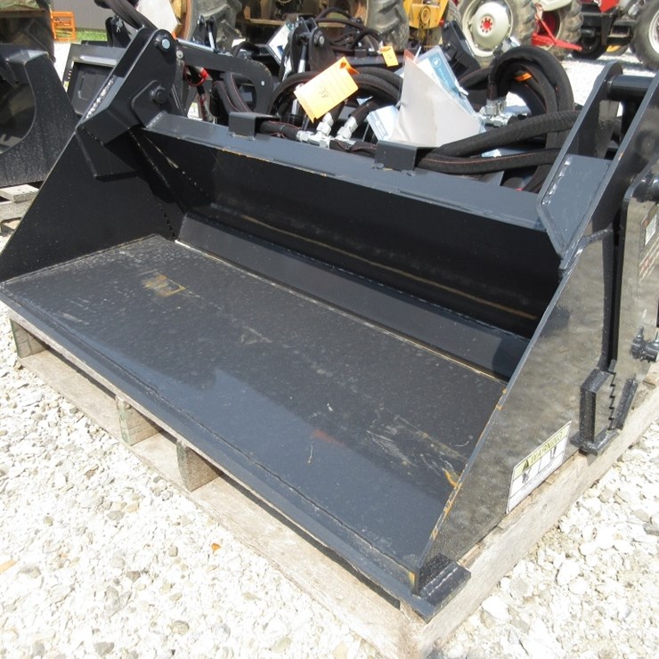 Wolverine Mini Skid Steer Combination Bucket