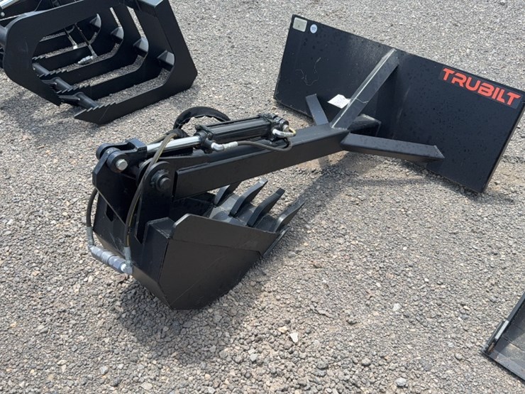 #2049-•-trubilt-skid-steer-stationary-backhoe-image-1