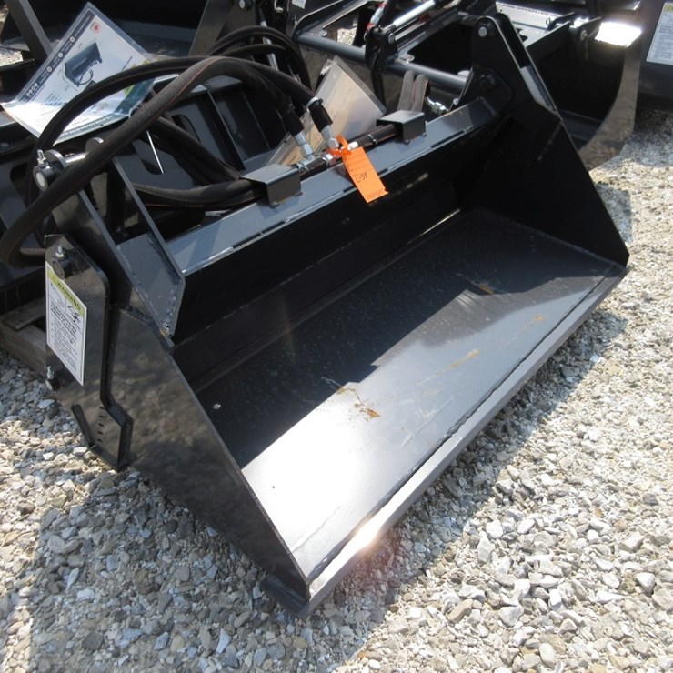 Wolverine Mini Skid Steer Combination Bucket