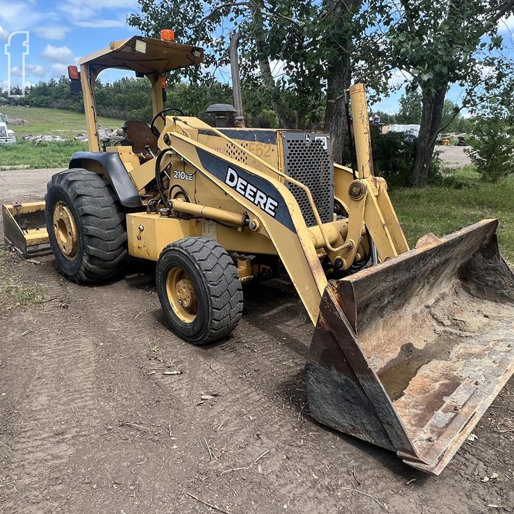 2006 DEERE 210LE