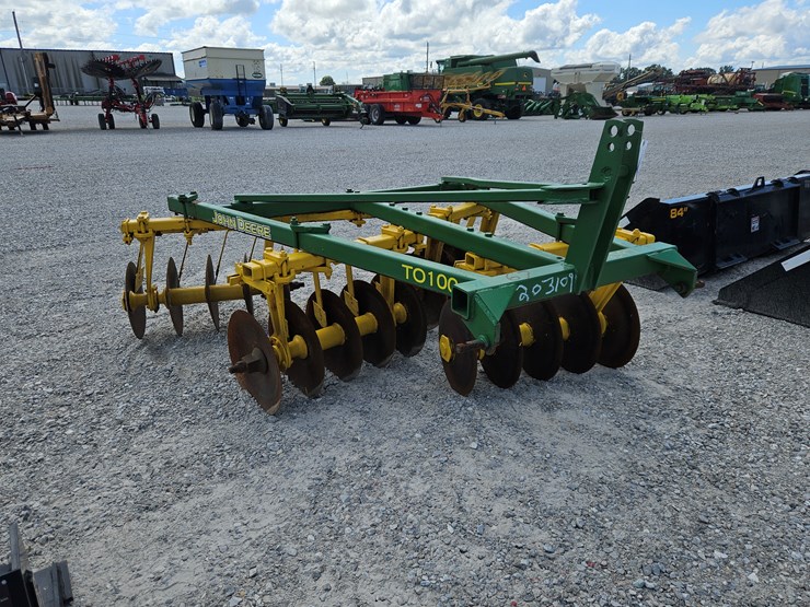 #203109-•-john-deere-t0100-disk-image-1