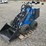 #1040-•-used-4-wheel-mini-skid-loader-image-1