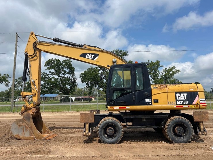 2011-caterpillar-m318d-image-1