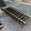 #2075-•-kc-70"-skid-steer-root-rake-inv#:-25306-image-1