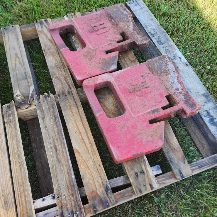 2 IH stamped suitcase weights