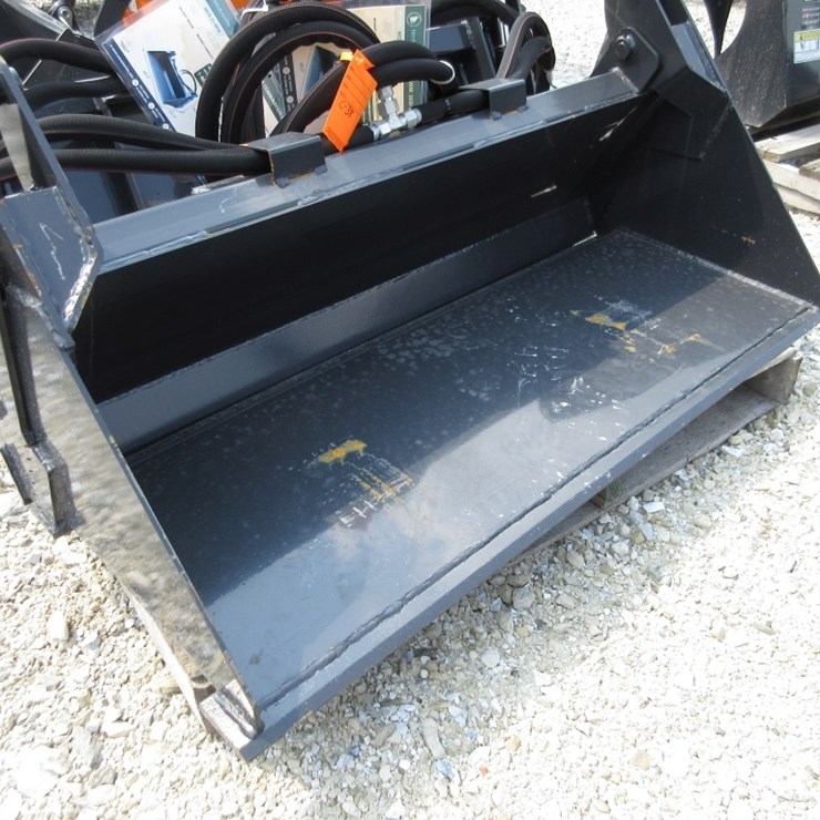 Wolverine Mini Skid Steer Combination Bucket