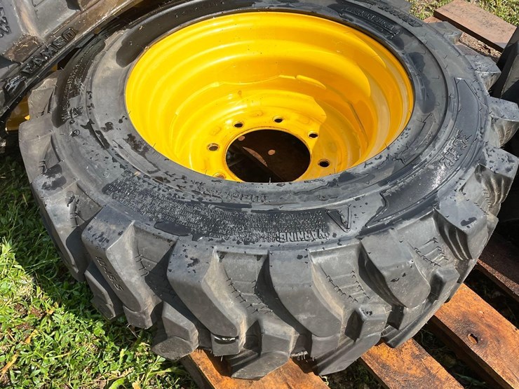 4-brand-new-265/70-16.5-skidloader-tires-&-rims-image-6