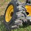 4-brand-new-265/70-16.5-skidloader-tires-&-rims-image-7