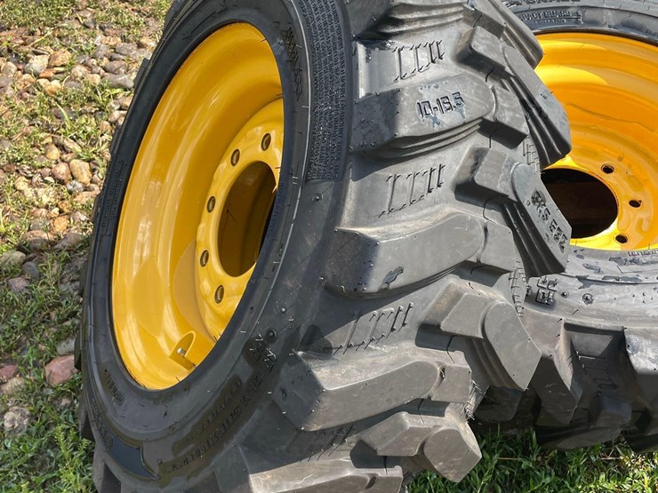 4-brand-new-265/70-16.5-skidloader-tires-&-rims-image-7