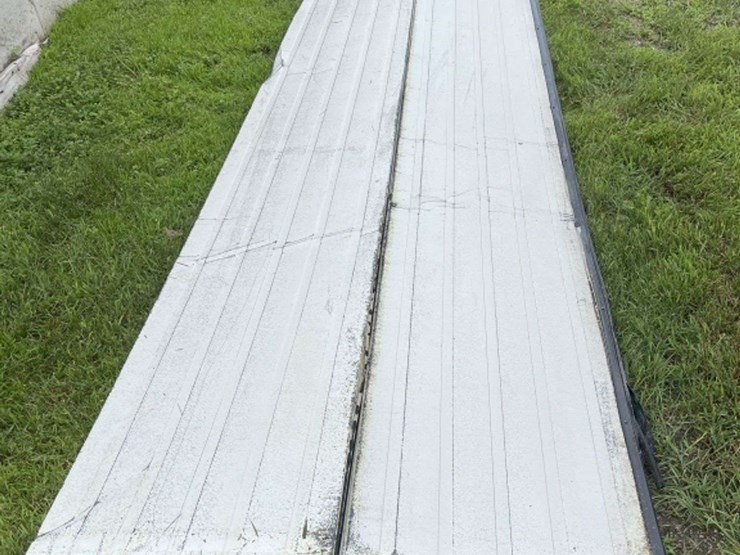 insulated-garage-door,-16’-wide-x-14’-tall,-has-some-damage,-see-photos-image-9