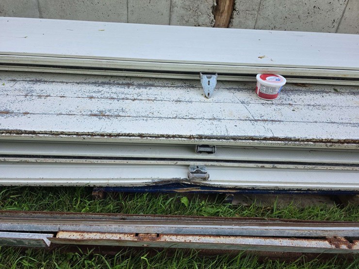 insulated-garage-door,-16’-wide-x-14’-tall,-has-some-damage,-see-photos-image-3