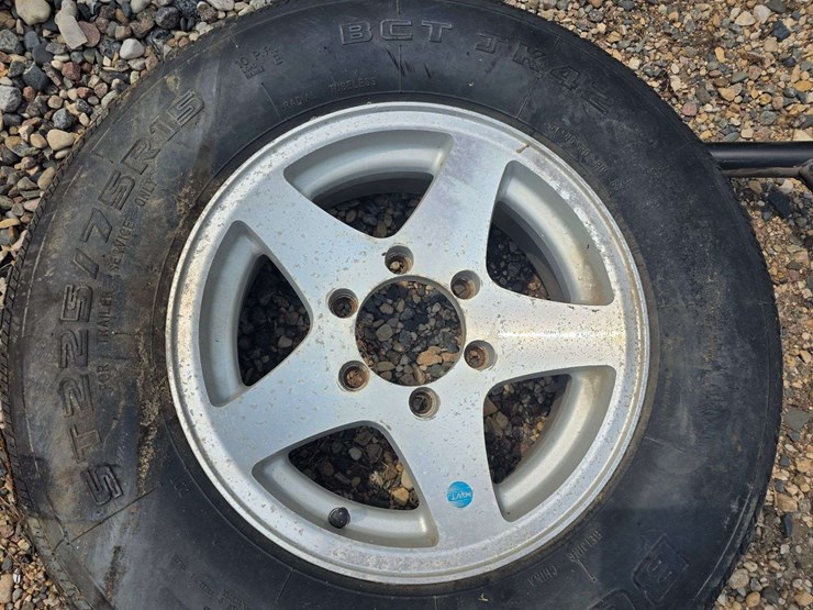 15”-tire-on-6-bolt-rim,-off-a-ice-castle-fish-house,-*needs-a-new-tire-image-4