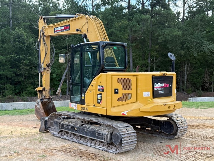 2019-caterpillar-310-image-1