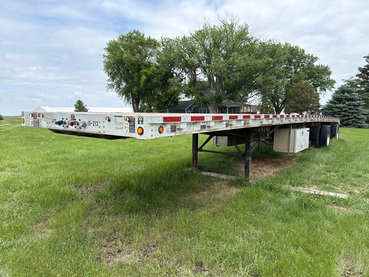 2010-wilson-97-1/2"-x-48ft-semi-flatbed-trailer-image-1