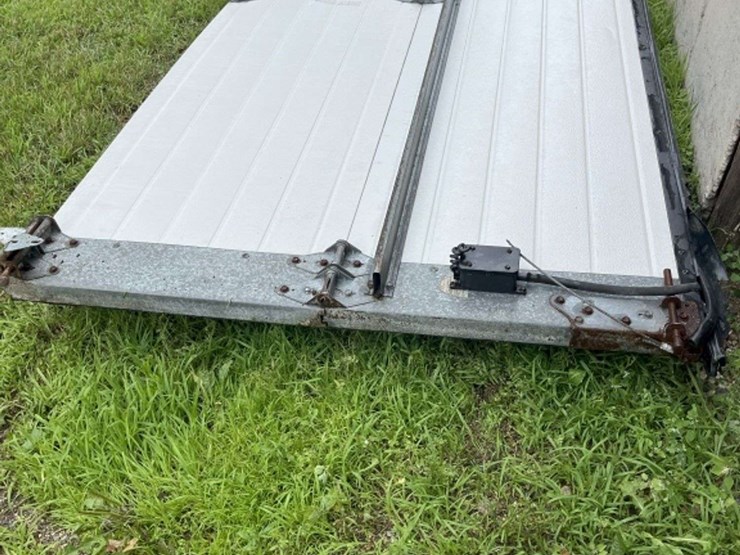 insulated-garage-door,-16’-wide-x-14’-tall,-has-some-damage,-see-photos-image-14