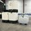 (3)-330-gallon-chemical-tanks,-cam-lock-on-bottom,-and-(1)-220-gallon-chemical-tank-with-non-working-image-1