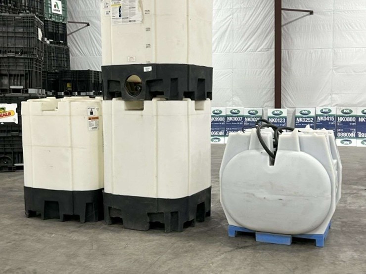 (3)-330-gallon-chemical-tanks,-cam-lock-on-bottom,-and-(1)-220-gallon-chemical-tank-with-non-working-image-1