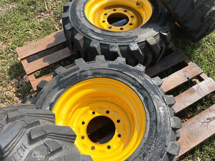 4-brand-new-265/70-16.5-skidloader-tires-&-rims-image-8