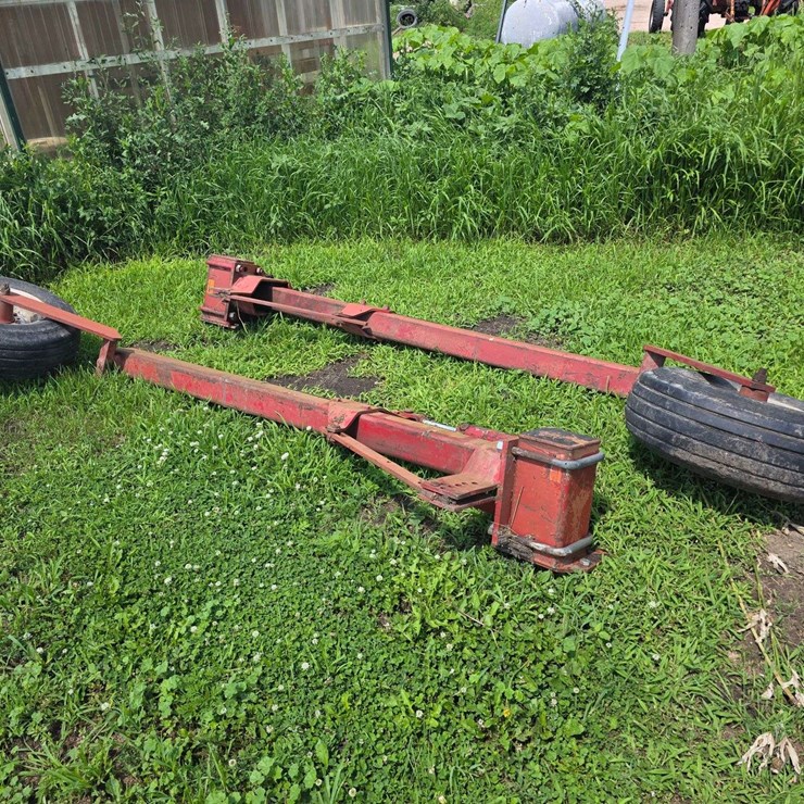 (2) Lift Assist Arms with 9.5L-14 Tires and Cylinders, off No Till Drill, Buying Both for One Money